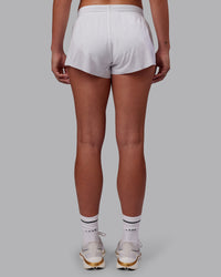 Woman wearing Accelerate 3" Running Short - White | Model:Charlize | Size:S | Thumbnail Index: 2