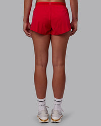 Woman wearing Accelerate Run Shorts - Scarlet | Set:true | Angle:back | Model:Charlize | Size:S | Thumbnail Index: 3