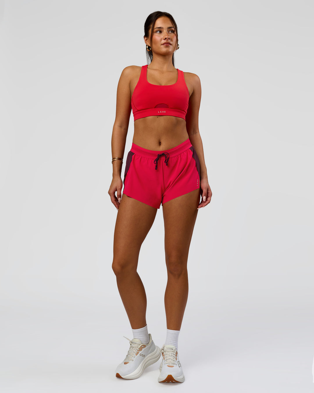 Woman wearing Accelerate 3" Mid-Rise Running Short - Cherry Lacquer-Scarlet | Model:Bianca | Size:S | - view 4