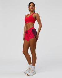 Woman wearing Accelerate 3" Mid-Rise Running Short - Cherry Lacquer-Scarlet | Model:Bianca | Size:S | | Thumbnail Index: 4