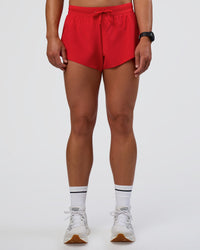 Woman wearing Accelerate 3" Mid-Rise Running Short - Flame | Set:true | Angle:front | Model:Sav | Size:S | Thumbnail Index: 6