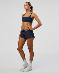 Woman wearing Accelerate 3" Mid-Rise Running Short - Future Navy-Baltic Sea | Model:Evie | Size:S | Thumbnail Index: 9