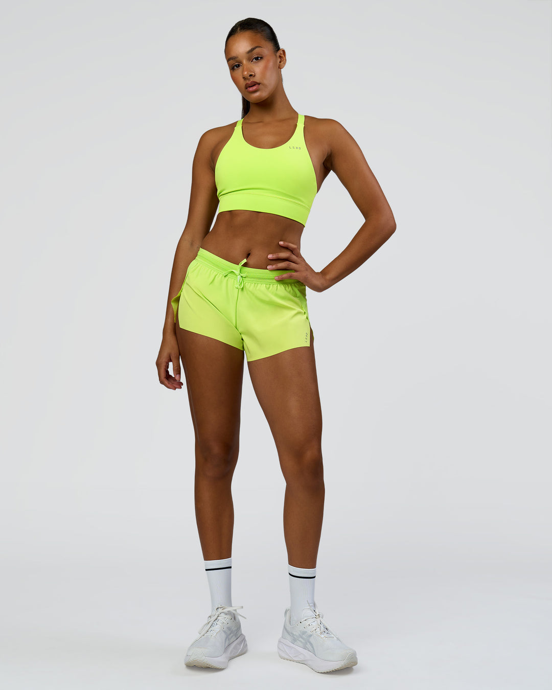 Woman wearing Accelerate 3" Mid-Rise Running Short - Hyper Green | Model:Rosie | Size:S - view 10