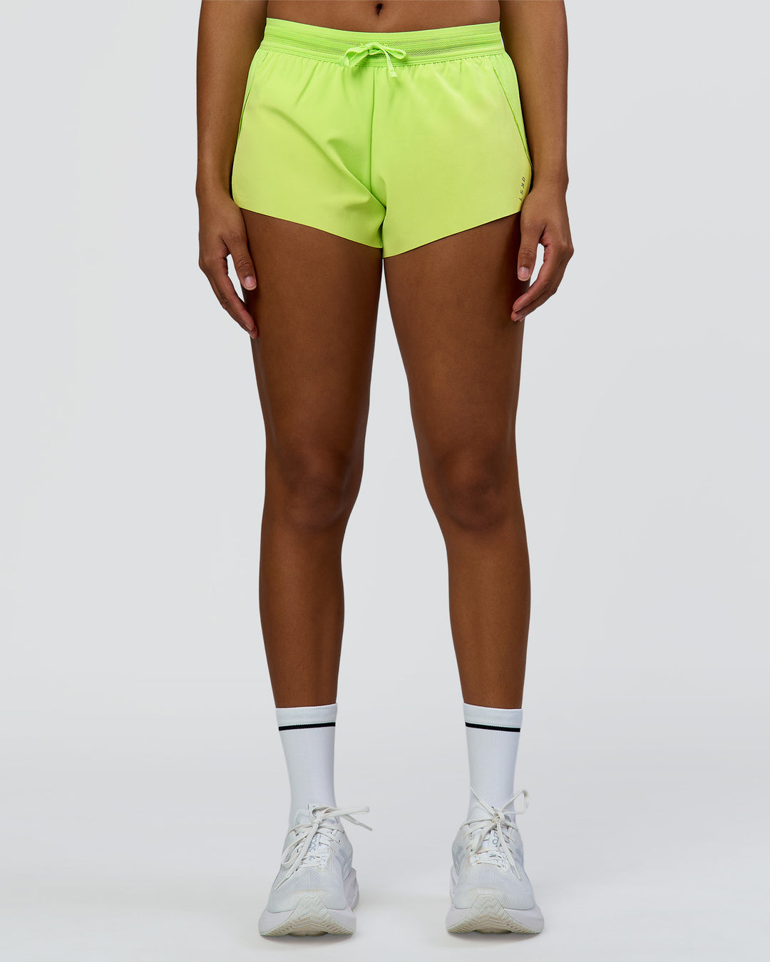 Woman wearing Accelerate 3" Mid-Rise Running Short - Hyper Green | Set:true | Angle:front | Model:Rosie | Size:S - view 7