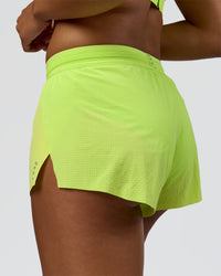 Woman wearing Accelerate 3" Mid-Rise Running Short - Hyper Green | Model:Rosie | Size:S | Thumbnail Index: 2