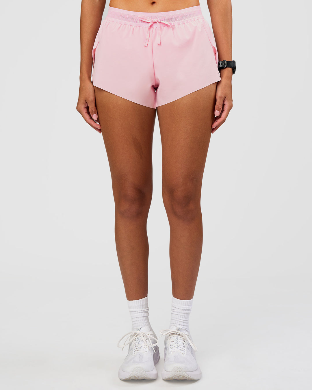 Woman wearing Accelerate 3" Mid-Rise Running Short - Marshmallow | Set:true | Angle:front | Model:Rhiley | Size:S - view 8