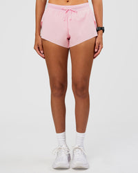 Woman wearing Accelerate 3" Mid-Rise Running Short - Marshmallow | Set:true | Angle:front | Model:Rhiley | Size:S | Thumbnail Index: 7
