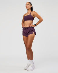 Woman wearing Accelerate 3" Mid-Rise Running Short - Midnight Plum | Model:Rhiley | Size:S | Thumbnail Index: 9