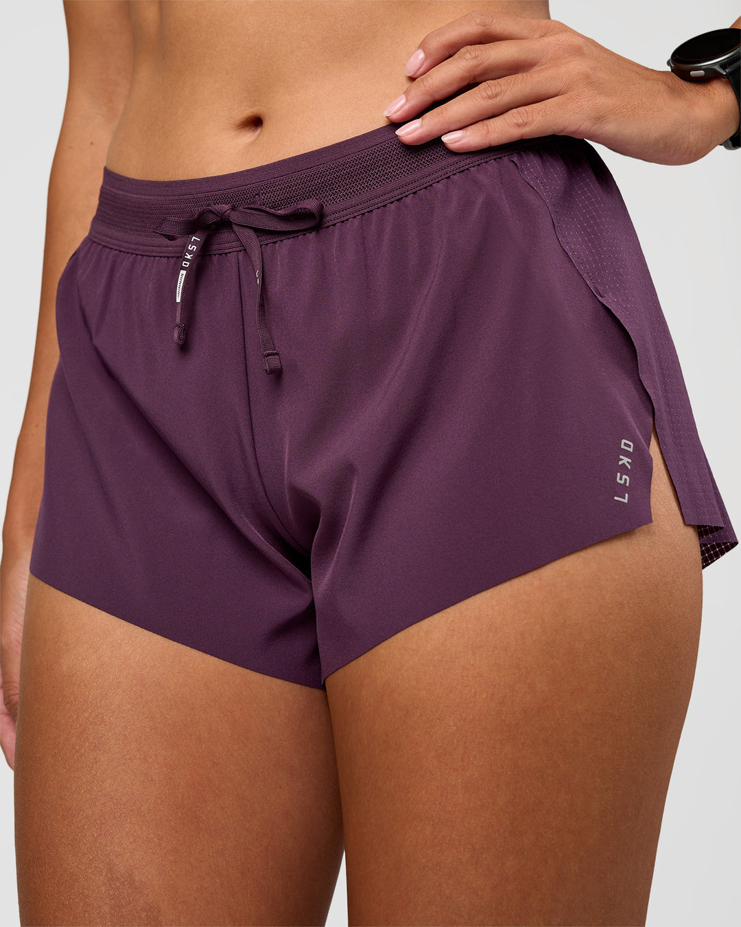 Woman wearing Accelerate 3" Mid-Rise Running Short - Midnight Plum | Set:True | Angle:closeup | Model:Rhiley | Size:S - view 9