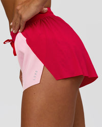 Woman wearing Accelerate 3" Mid-Rise Running Short - Scarlet-Marshmallow | Model:Amity | Size:S | Thumbnail Index: 4