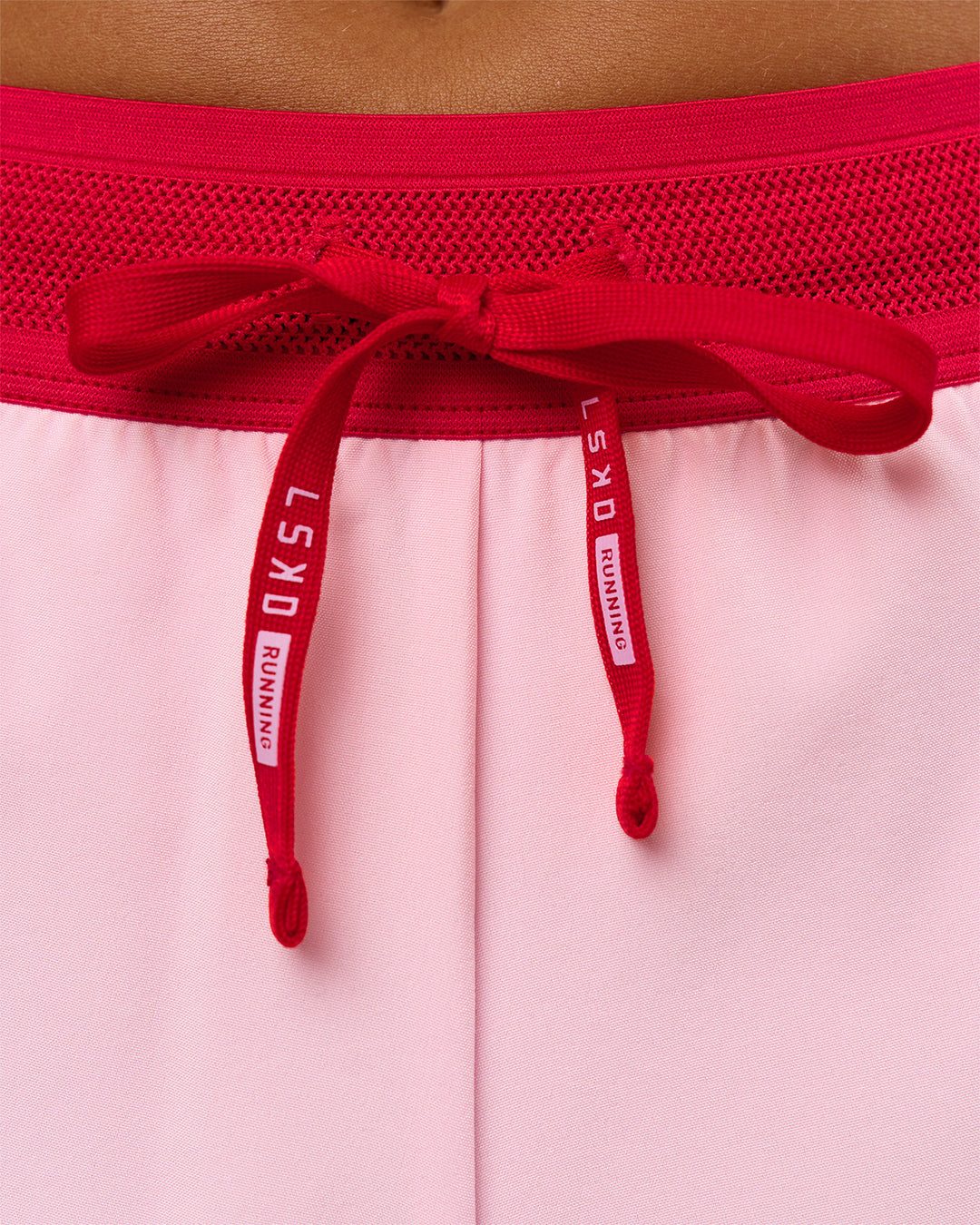 Woman wearing Accelerate 3" Mid-Rise Running Short - Scarlet-Marshmallow | Model:Amity | Size:S - view 9