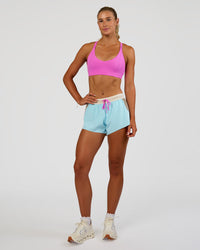 Woman wearing Accelerate 3" Mid-Rise Running Short - Taupe Ash-Glacial Blue | Model:Emelia | Size:S | Thumbnail Index: 6