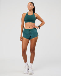 Woman wearing Accelerate 3" Mid-Rise Running Short - Transformative Teal | Model:Rhiley | Size:S | Thumbnail Index: 6