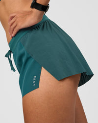 Woman wearing Accelerate 3" Mid-Rise Running Short - Transformative Teal | Model:Rhiley | Size:S | Thumbnail Index: 5