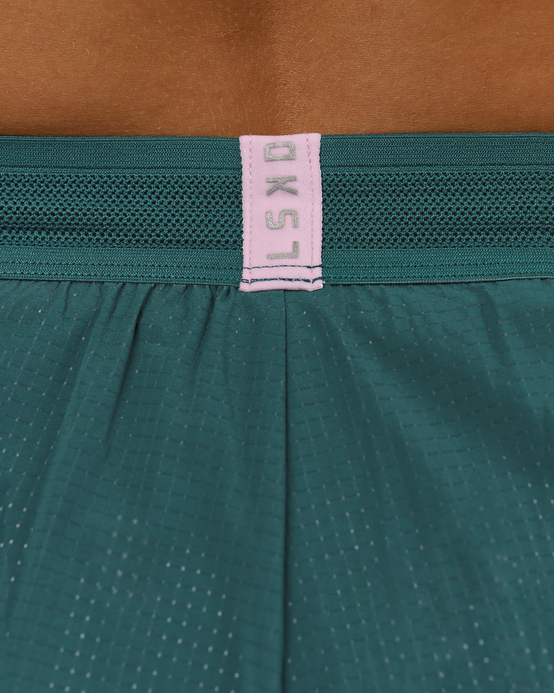Woman wearing Accelerate 3" Mid-Rise Running Short - Transformative Teal-Marshmallow | Model:Amity | Size:S - view 10