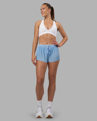 Woman wearing Accelerate 3" Pleated Running Short - Open Air | Model:Charlize | Size:S | Thumbnail Index: 8