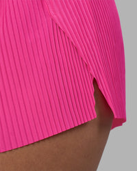 Woman wearing Accelerate 3" Pleated Running Short - Ultra Pink | Model:Rhiley | Size:S | Thumbnail Index: 11
