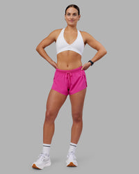 Woman wearing Accelerate 3" Running Short - Ultra Pink | Model:Keisha | Size:S | Thumbnail Index: 10