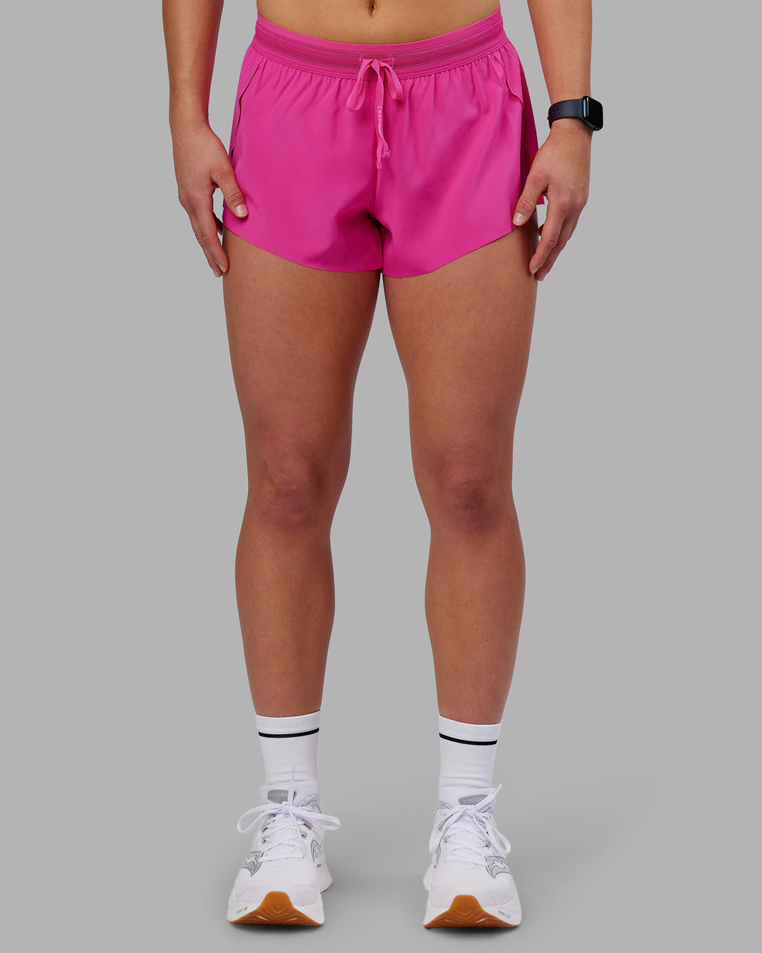 Woman wearing Accelerate 3" Running Short - Ultra Pink | Set:true | Angle:front | Model:Keisha | Size:S - view 1