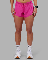 Woman wearing Accelerate 3" Running Short - Ultra Pink | Set:true | Angle:front | Model:Keisha | Size:S | Thumbnail Index: 0