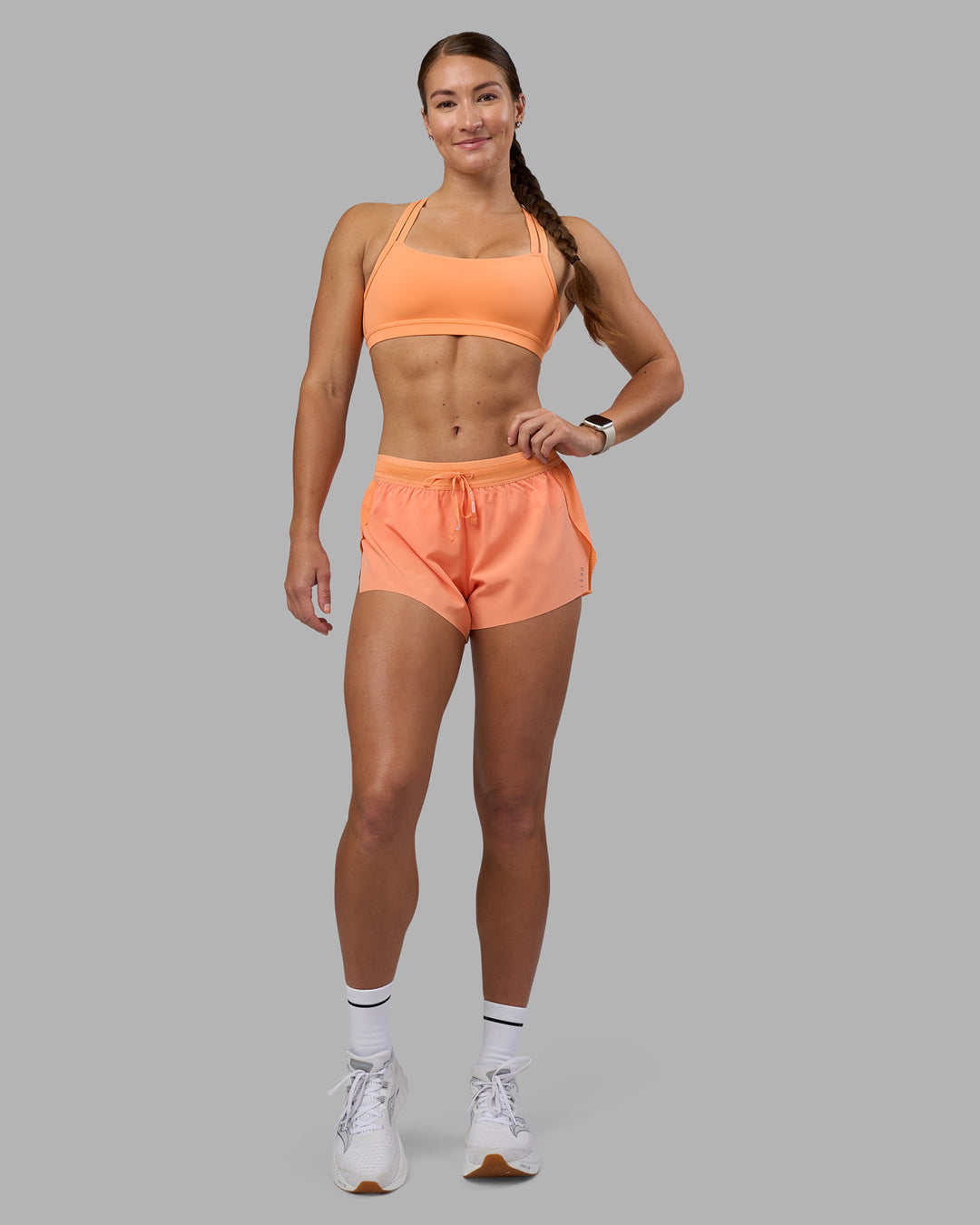 Woman wearing Accelerate 3" Running Short - Cantaloupe | Model:Hannah | Size:S - view 5