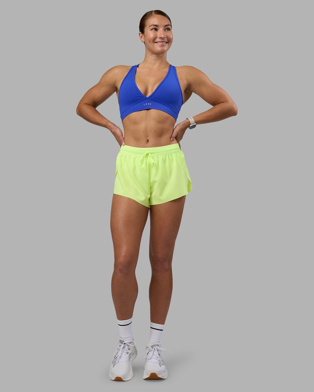 Woman wearing Accelerate 3" Running Short - Lime Glo | Model:Hannah | Size:S - view 8