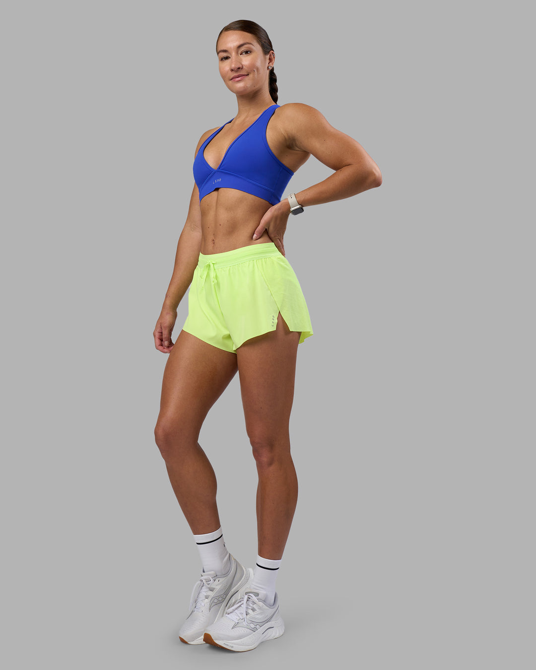 Woman wearing Accelerate 3" Running Short - Lime Glo | Model:Hannah | Size:S - view 12