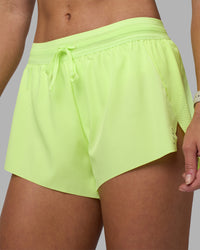 Woman wearing Accelerate 3" Running Short - Lime Glo | Model:Hannah | Size:S | Thumbnail Index: 12