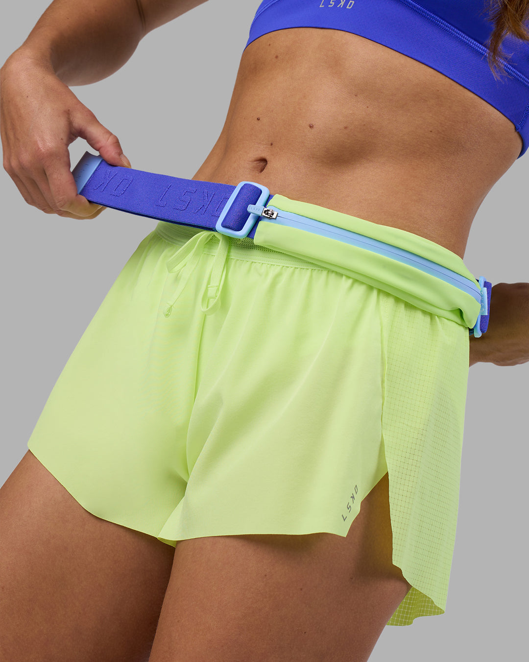 Woman wearing Accelerate 3" Running Short - Lime Glo | Model:Hannah | Size:S - view 11