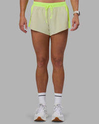 Woman wearing Accelerate 3" Running Short - Lime Glo-Shale Beige | Model:Hannah | Size:S | Thumbnail Index: 14
