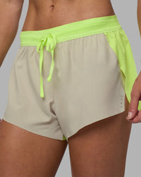 Woman wearing Accelerate 3" Running Short - Lime Glo-Shale Beige | Model:Hannah | Size:S | Thumbnail Index: 12