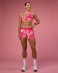 Woman wearing Accelerate 3" Running Short - Pink Glow Print | Model:Hannah | Size:S | Thumbnail Index: 4
