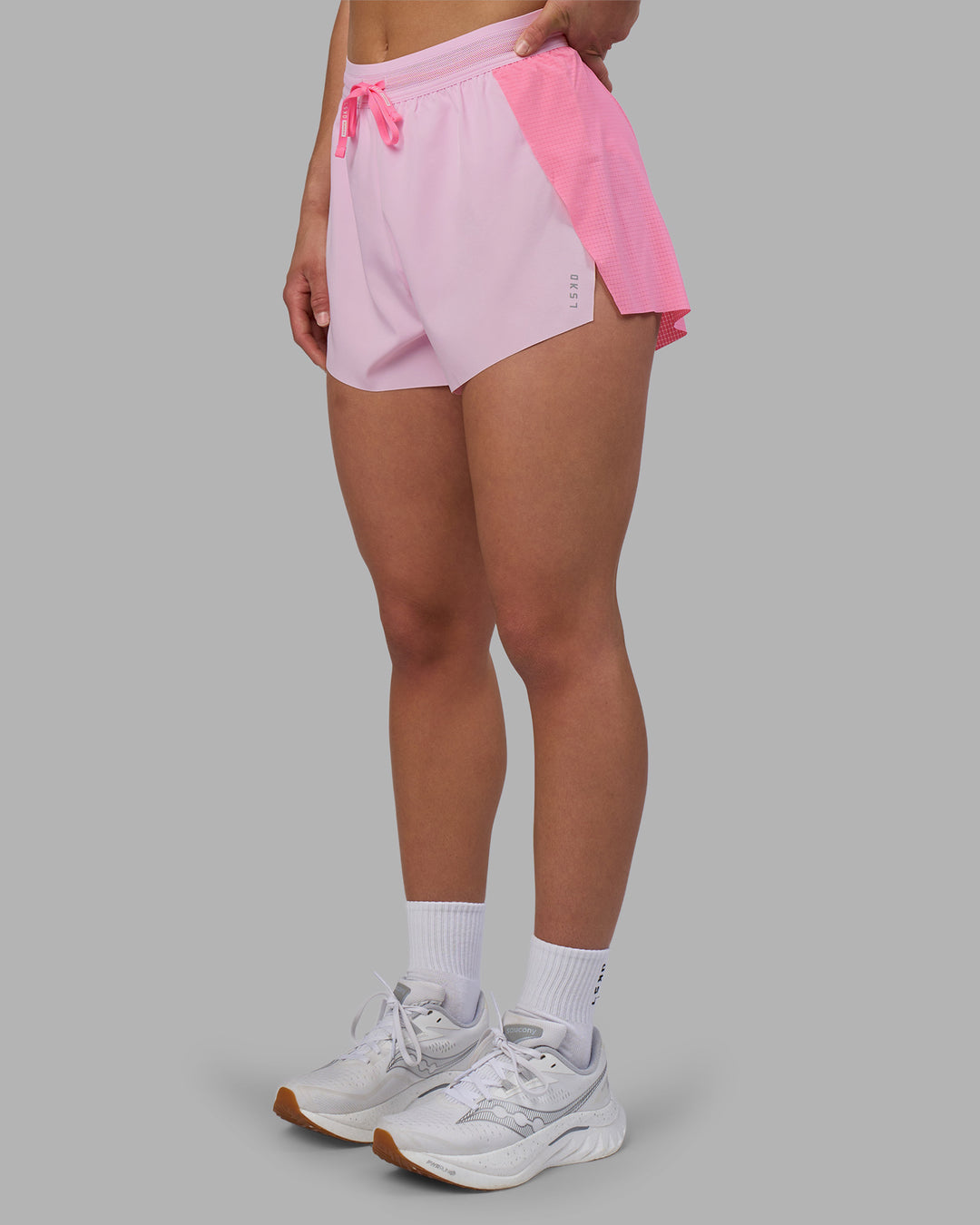 Woman wearing Accelerate 3" High-Rise Running Short - Candy Pink-Marshmallow | Set:true | Angle:side | Model:Keisha | Size:S - view 7