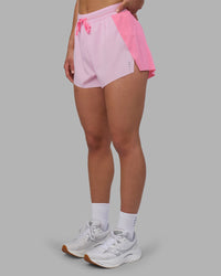 Woman wearing Accelerate 3" High-Rise Running Short - Candy Pink-Marshmallow | Set:true | Angle:side | Model:Keisha | Size:S | Thumbnail Index: 6