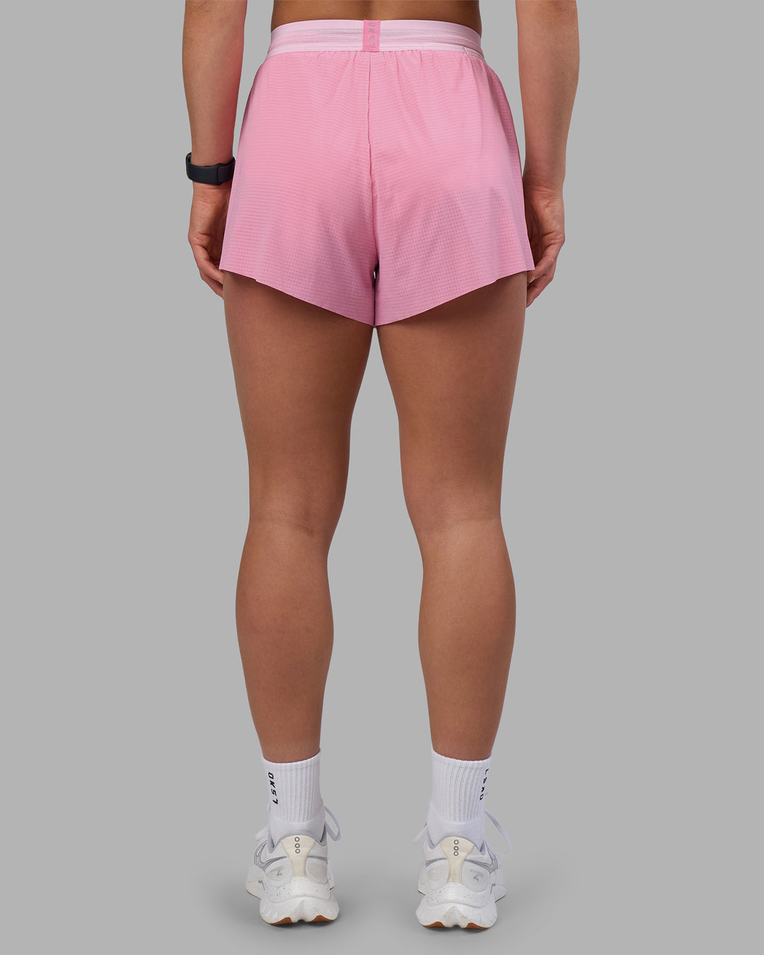 Woman wearing Accelerate 3" High-Rise Running Short - Candy Pink-Marshmallow | Set:true | Angle:back | Model:Keisha | Size:S - view 4