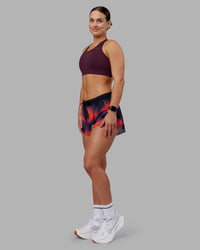 Woman wearing Accelerate Split Strap Sports Bra - Cherry Lacquer | Model:Keisha | Size:S | Thumbnail Index: 2