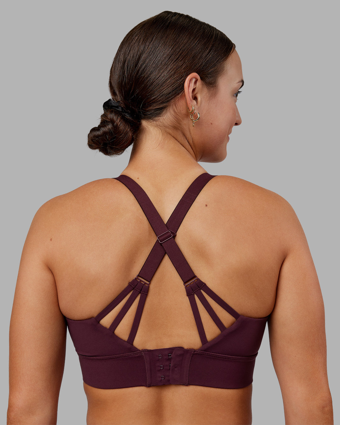 Woman wearing Accelerate Split Strap Sports Bra - Cherry Lacquer | Model:Keisha | Size:S - view 6