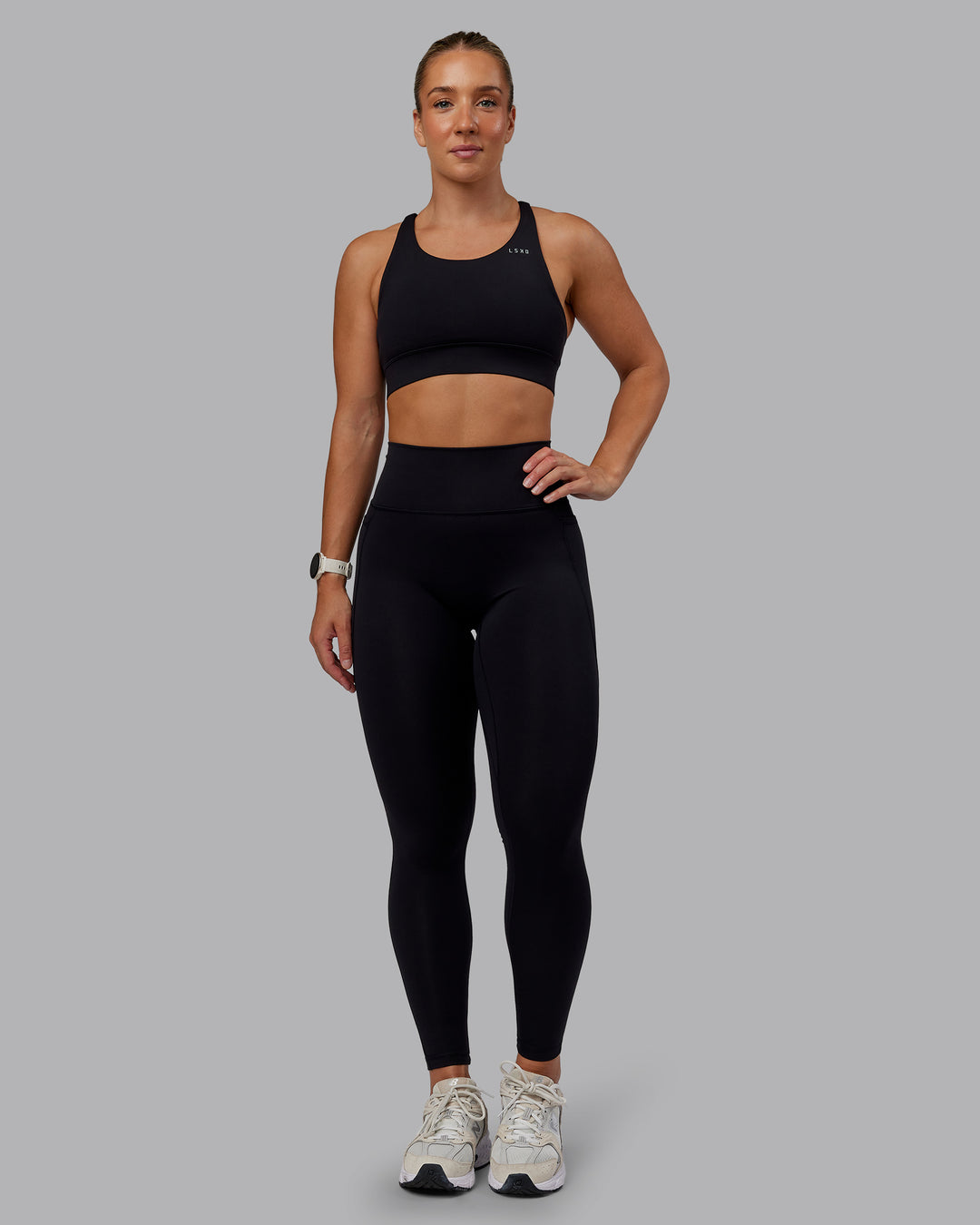 Woman wearing Accelerate Sports Bra in Black | Size:S - view 5