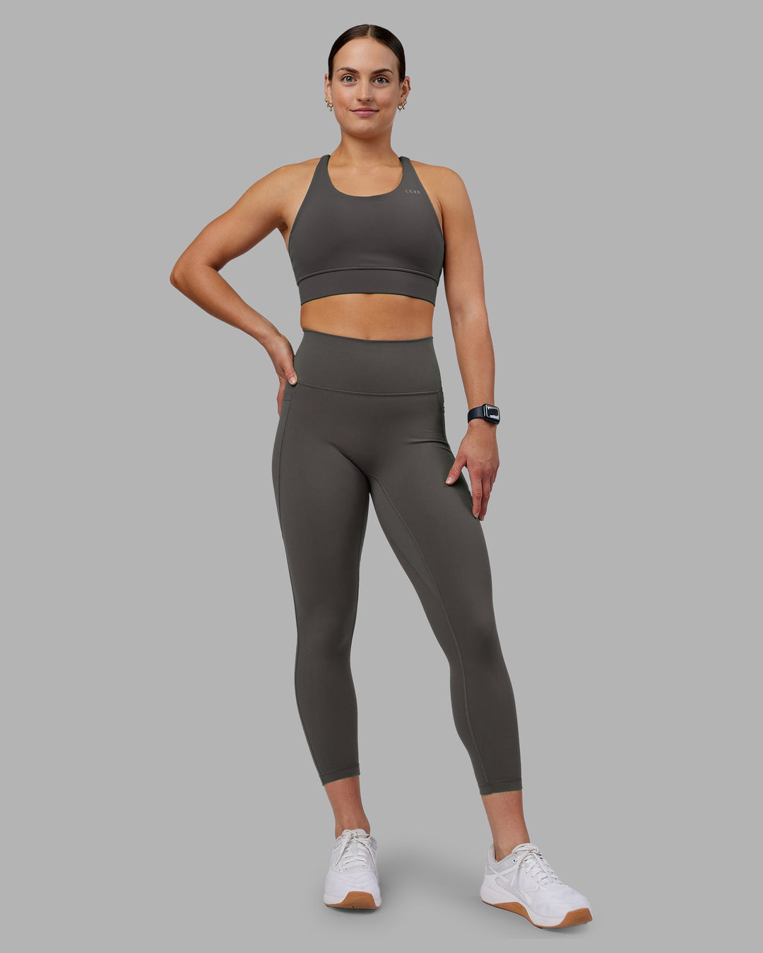 Woman wearing Accelerate Sports Bra - Dark Storm | Model:Keisha | Size:S - view 3