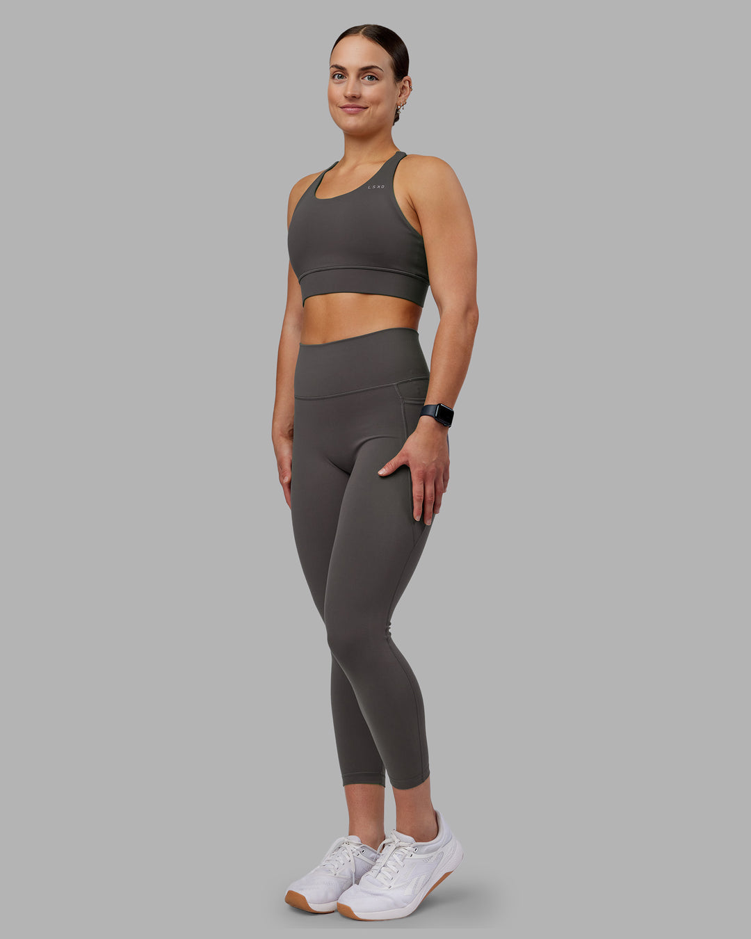 Woman wearing Accelerate Sports Bra - Dark Storm | Model:Keisha | Size:S - view 4