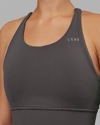 Woman wearing Accelerate Sports Bra - Dark Storm | Model:Keisha | Size:S | Thumbnail Index: 4