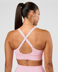 Woman wearing Accelerate Sports Bra - Marshmallow | Set:true | Angle:back | Model:Rhiley | Size:S | Thumbnail Index: 1