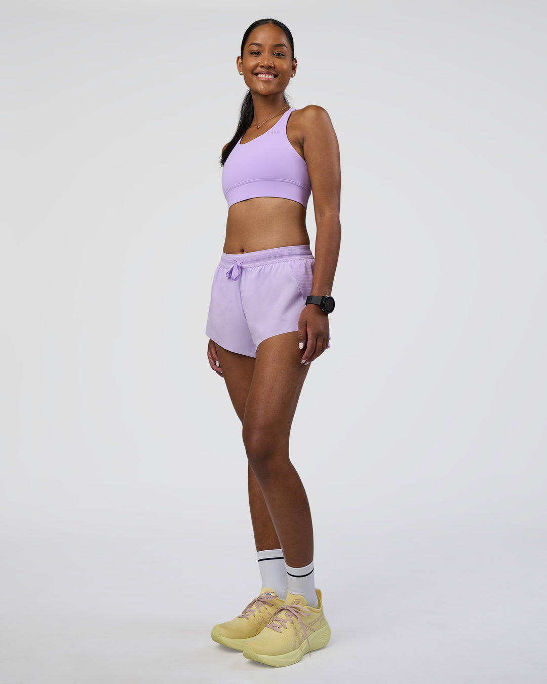 Woman wearing Accelerate Sports Bra - Pale Lilac | Model:Rica | Size:S - view 5