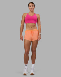 Woman wearing Accelerate Sports Bra - Ultra Pink | Model:Hannah | Size:S | Thumbnail Index: 4