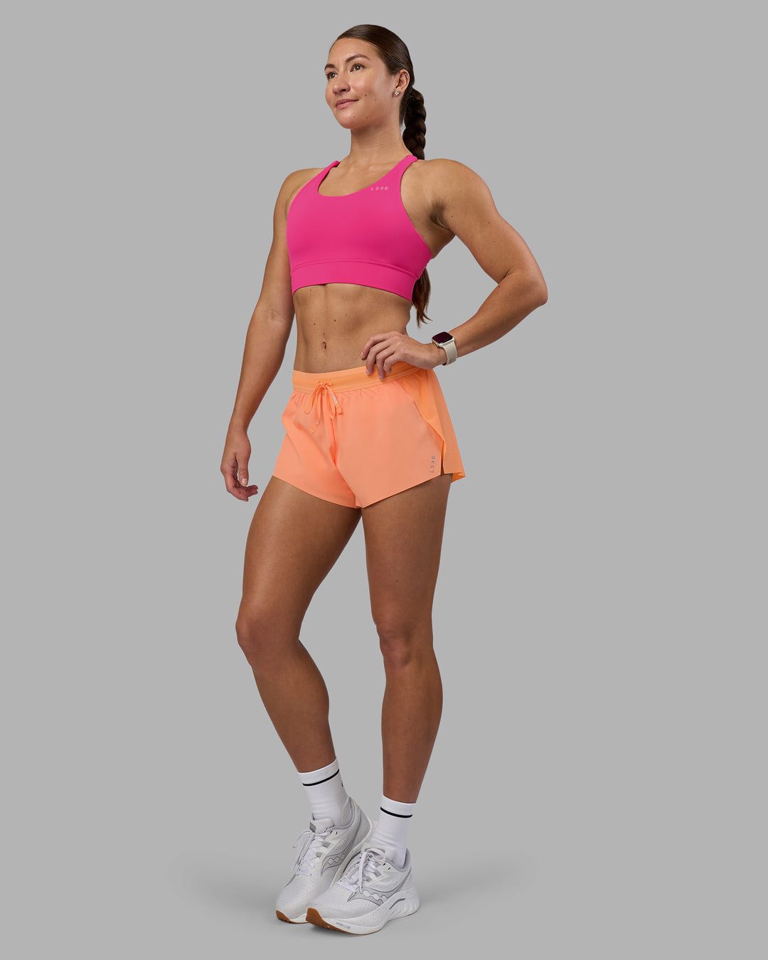 Woman wearing Accelerate Sports Bra - Ultra Pink | Model:Hannah | Size:S - view 3