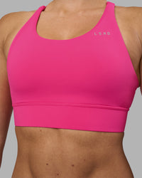 Woman wearing Accelerate Sports Bra - Ultra Pink | Model:Hannah | Size:S | Thumbnail Index: 3