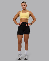 Woman wearing Advance Sports Bra - Lemon | Thumbnail Index: 4