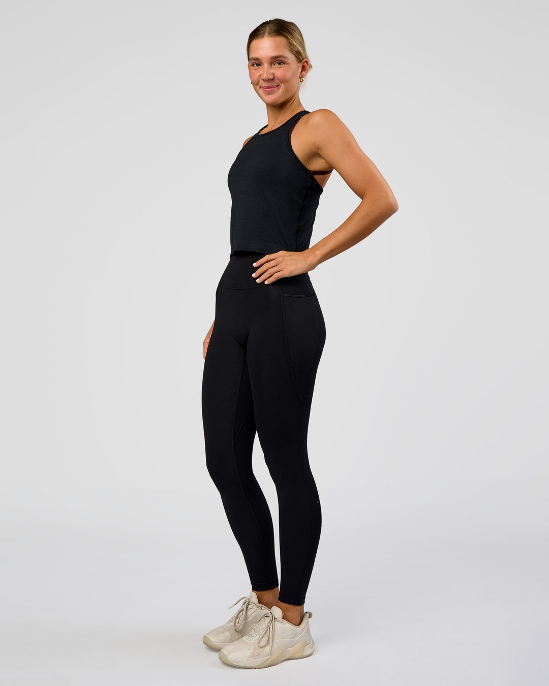 Woman wearing AeroFLX+ Seamless Flow Skimmer Tank - Black Marl | Model:Amity | Size:S - view 5