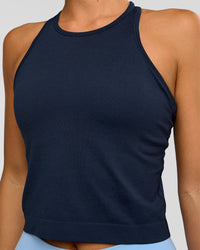 Woman wearing AeroFLX+ Seamless Flow Skimmer Tank - Future Navy/Future Navy | Model:Amity | Size:S | Thumbnail Index: 3