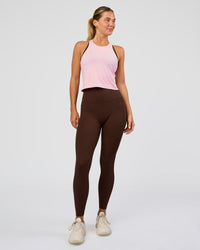 Woman wearing AeroFLX+ Seamless Flow Skimmer Tank - Marshmallow/Marshmallow | Model:Amity | Size:S | Thumbnail Index: 1